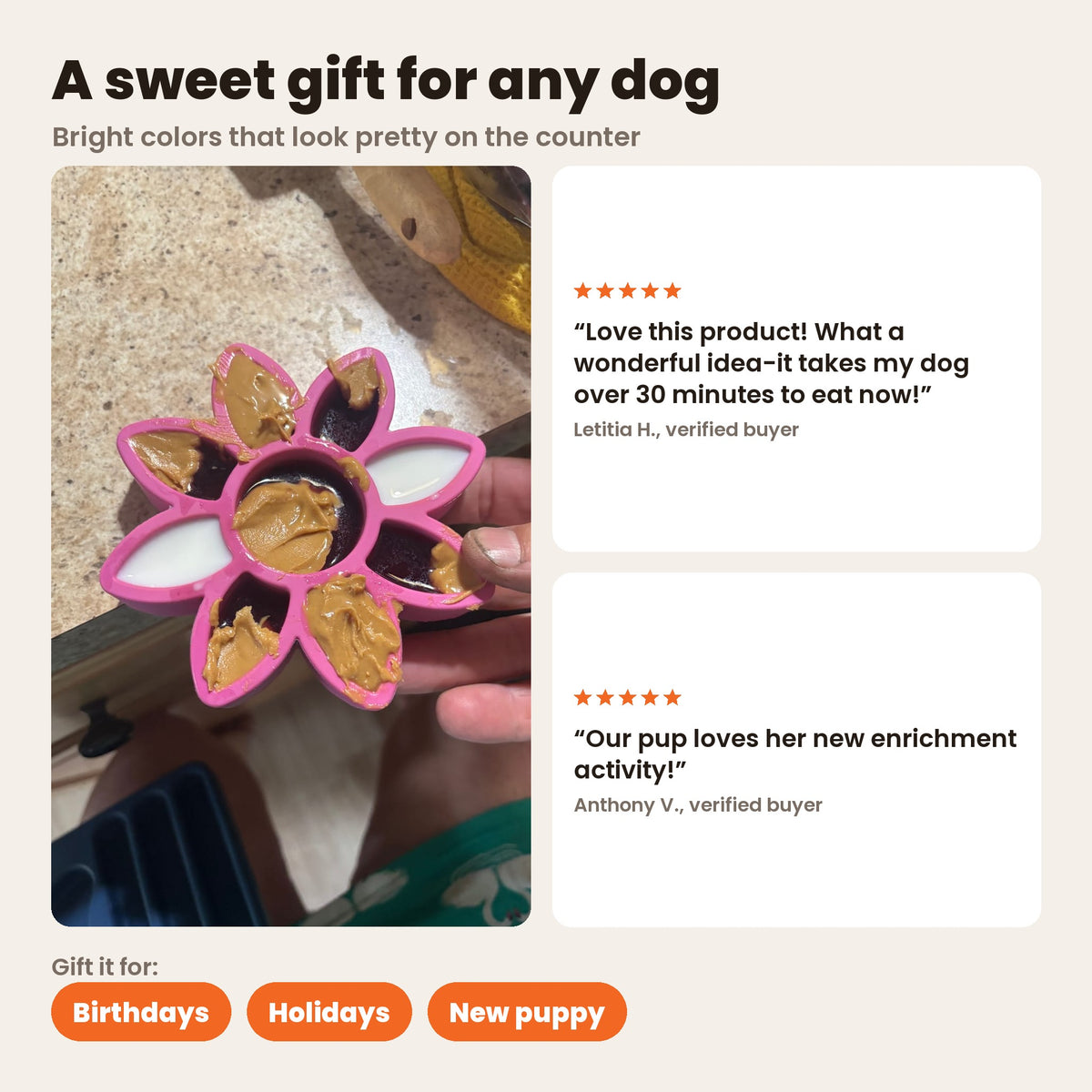 FreezFlower in pink, filled with peanut butter and held over a kitchen counter, a sweet gift for birthdays, holidays or a new puppy. Reviews from Letitia H. and Anthony V.