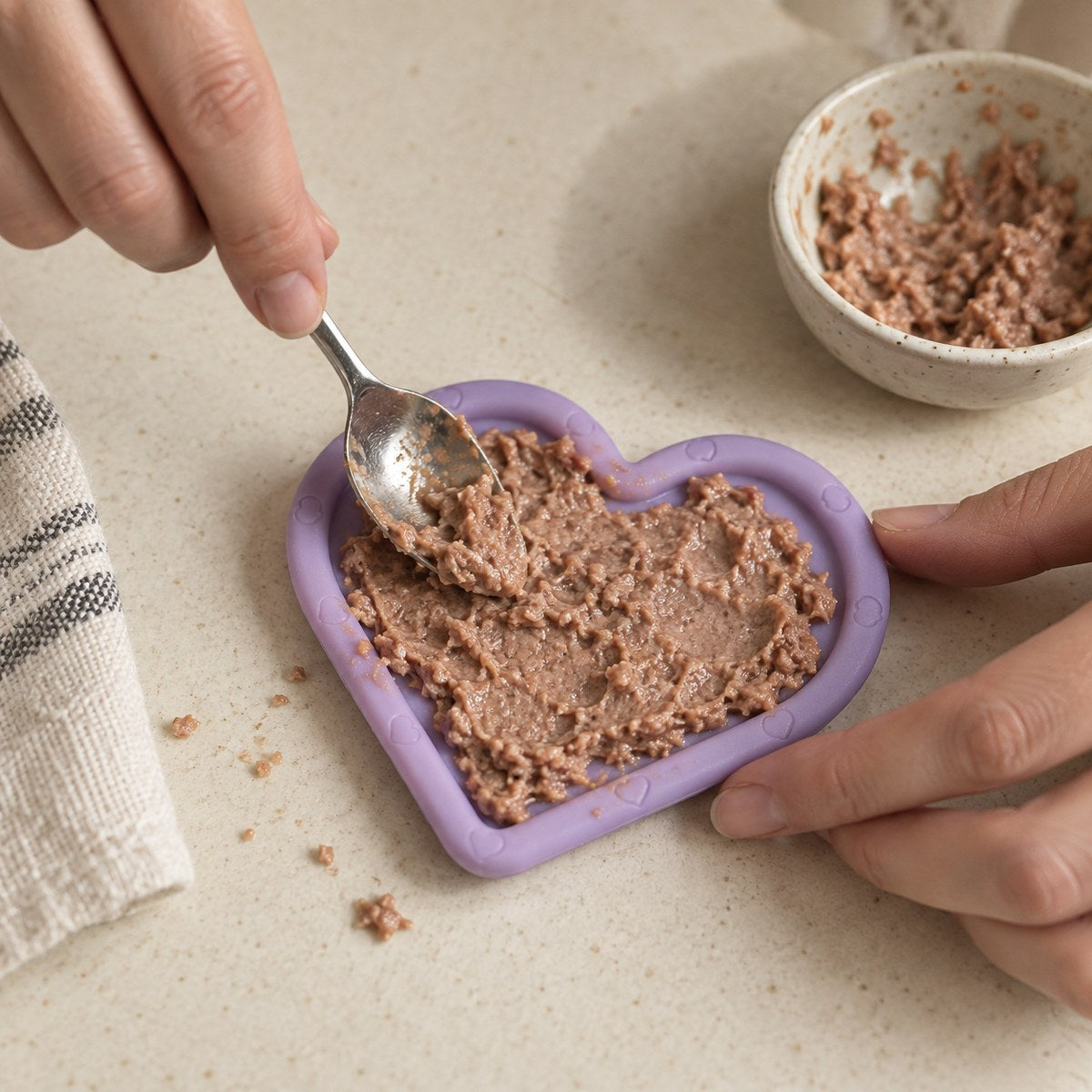 Filling a FreezLove with a soft treat